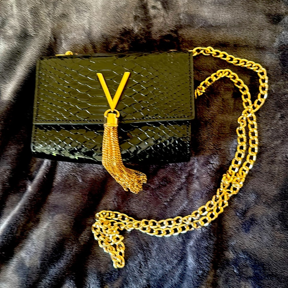 Valentineno by Mario Valentino Divina
(Fake)